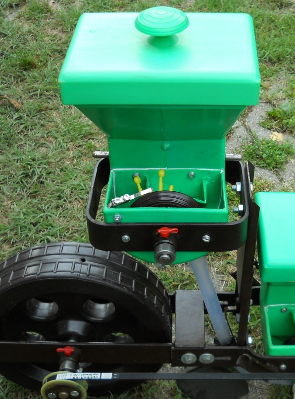 Granule dosing adapter for professional seed drills